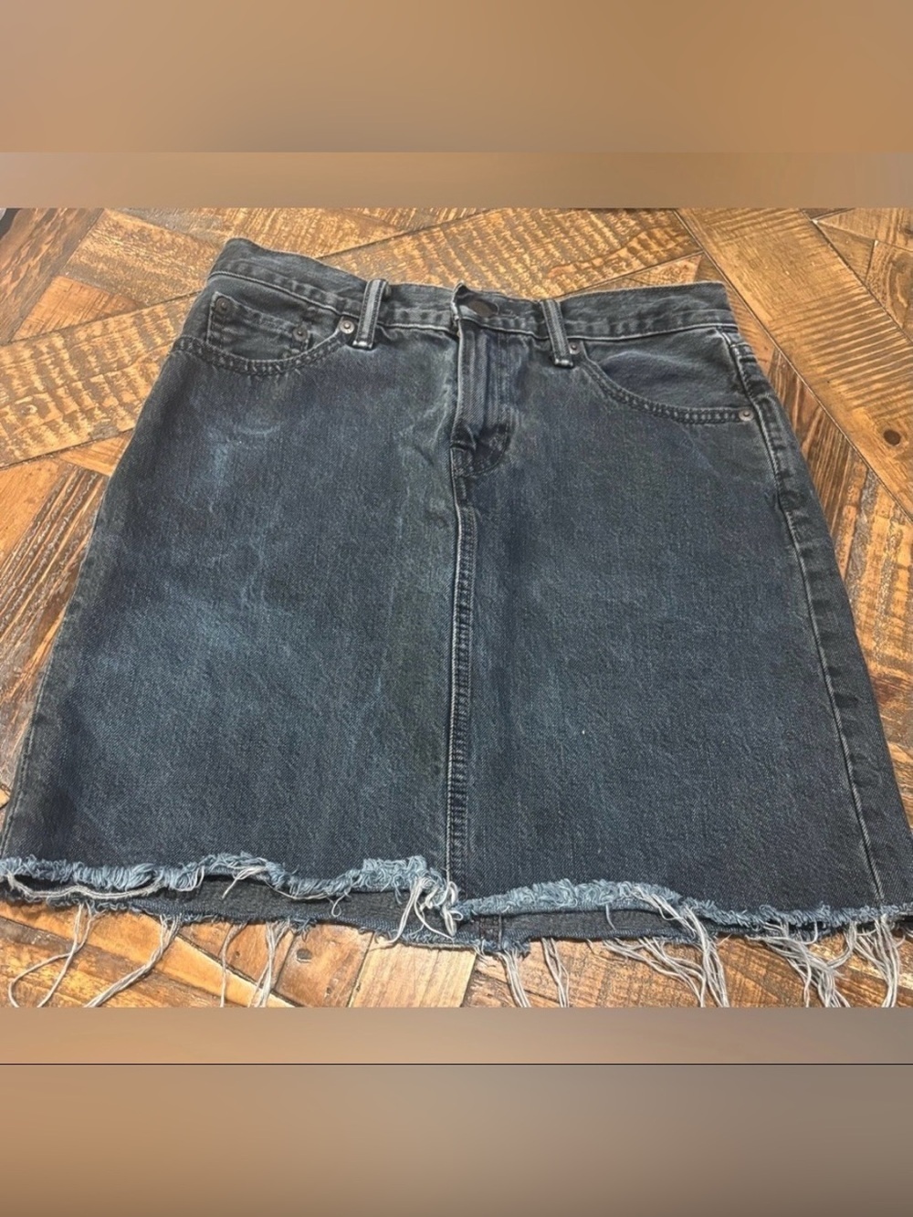 Levi's Charcoal Denim Mini Skirt in size 25. Great condition! Frayed edges